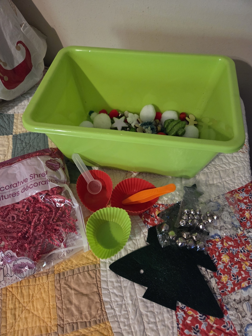 Fun bad of crinkle red paper & Christmas themed sensory bin add ins No Bin Inclu